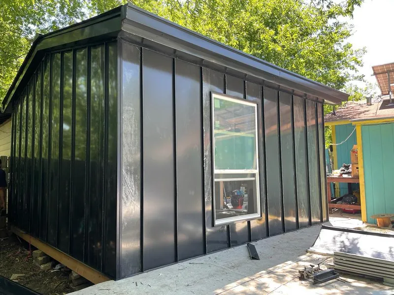 Black standing seam metal wall panels for Roof Inspection in Chocolay